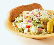Insalata · St. Louis style Italian salad topped with a house made dressing. A blend of romaine and iceb...