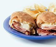 Ham and Cheese Sandwich · Shaved ham and our cheese blend toasted on our rustic Italian bread with a side of our house made ranch dressing.