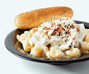 White Chicken Pasta · House-made Alfredo sauce with chicken, bacon, and mushrooms over cavatappi noodles topped wi...