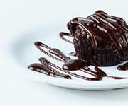 Vegan Chocolate Bomb · Dense gooey brownie made by be free bakers. Gluten-free, vegan and nut free.