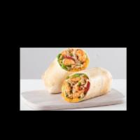 IT'S BACK! CAJUN SHRIMP WRAP · seasoned shrimp, dirty rice, creole sauce, cheddar, romaine, tomato and green onions in a to...