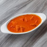36. Chicken Tikka Masala · Chicken marinated and roasted in clay oven and cooked with masala sauce.