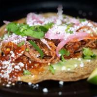 Barbacoa Taco. · Beef tenderloin, chipotle salsa, shaved radish, cotija, cilantro.