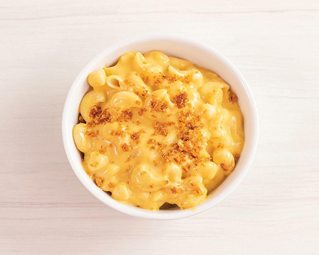 bowl of mac + cheese · serves 1 | served with gremolata bread crumbs and lemon zest.