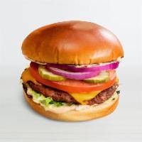 the vg classic · beyond burger, american cheese, special sauce, lettuce, tomato, pickle, and red onion on a b...