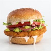 santa fe chickin'  · crispy chickin’, mashed avocado, southwestern mayo, lettuce, sliced tomato, and pickled onio...