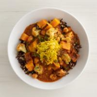 masala chickpea curry bowl · roasted butternut squash, turmeric cauliflower, and braised cabbage over masala-spiced chick...