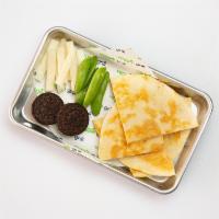 kids' quesadilla  · toasted flour tortilla with melted cheese. substitute corn tortillas - no charge.