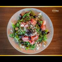 Greek Salad · ROMAINE LETTUCE, CUCUMBER, TOMATO, KALAMATA OLIVES,
BEETS, PEPPERONCINI, FETA, AND RED ONION
