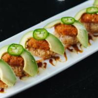 Crispy Rice Spicy Tuna · 6 pieces of lightly fried crispy sushi rice topped with spicy tuna, jalapeno, avocado and gr...
