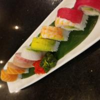 Rainbow Roll · California roll topped with Ahi Tuna, salmon, red snapper, albacore, shrimp and avocado serv...