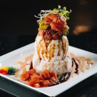 Happy Ahi Tower Roll · Sushi rice, spicy, tuna, avocado, crab meat and Ahi Tuna with 4 different kinds of caviar, p...