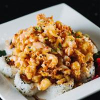 Popcorn Lobster Roll · Spicy tuna roll topped with lightly battered deep-fried crawfish. Served with house special ...