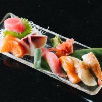Sushi and Sashimi Combo Lunch · Ahi Tuna, salmon, albacore and shrimp. Served with miso soup and salad.