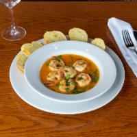 Sauteed Garlic Shrimp in Broth Plate · Served with sliced baguette.