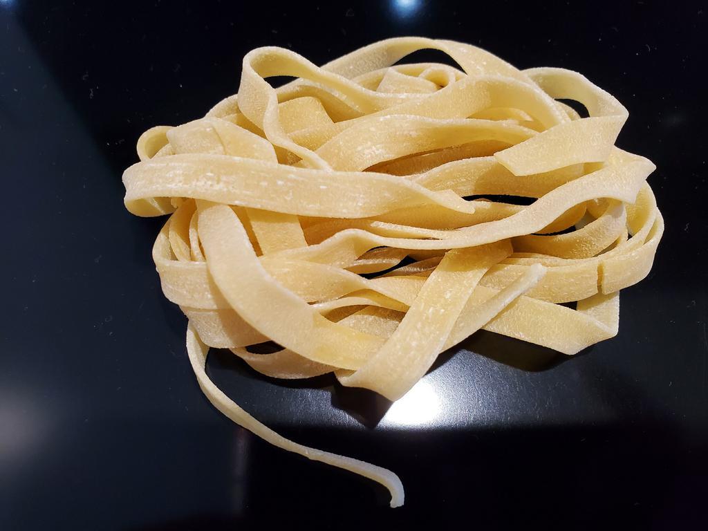 Fettucine · Flat thick pasta.