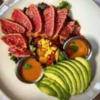 Ahi Tuna Salad · Mixed greens, red and yellow cherry tomatoes, avocado, toasted sesame seeds & mango with cil...