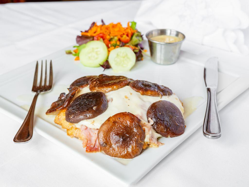 Chicken Alberto · Lightly breaded chicken breast smothered with Italian cooked ham, fresh mozzarella & sauteed shiitake mushrooms. Served with mix greens and tomato.