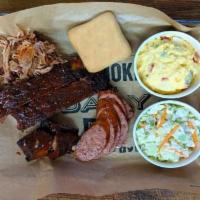 Pork Out Platter · Ribs, pulled pork, pork burnt ends and choice of sliced sausage, 2 sides and a roll