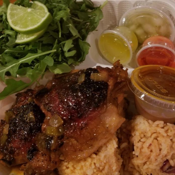 Double Chicken · 2 Belizean chicken thighs served with seasoned coconut rice and beans, salad, salsa and your choice of habanero sauce. Gluten-free.