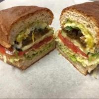 The Veggie Sub · Sauteed onions and peppers, banana peppers, cucumbers, lettuce, tomatoes, fresh avocado, pro...