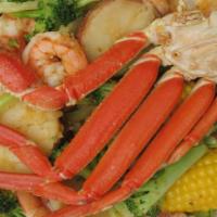 Personal Seafood Boil Combo · 1 snow crab leg (cluster), 10 shrimp, 2 corn, 2 potatoes, 2 boiled eggs and broccoli.