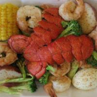 Lobster Tail Combo · 1 lobster tail, 8 jumbo shrimp, 1 corn, 1 potato, 1 boiled egg and broccoli.