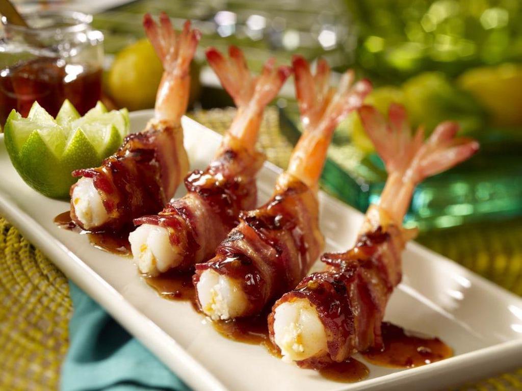  Honey Habanero Shrimp Appetizer · Sweet and Fiery. Four mesquite-grilled jumbo shrimp stuffed with fresh minced habanero and 
crumbled queso fresco, wrapped in smoked bacon and topped with the honey chipotle glaze.