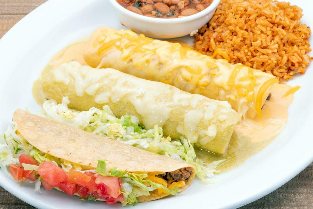 Tex-Mex Combination Dinner · Beef enchilada with agave queso sauce,
chicken enchilada with creamy hatch chile
sauce and one crispy beef taco.  Served with Mexican rice and frijoles a la charra.
