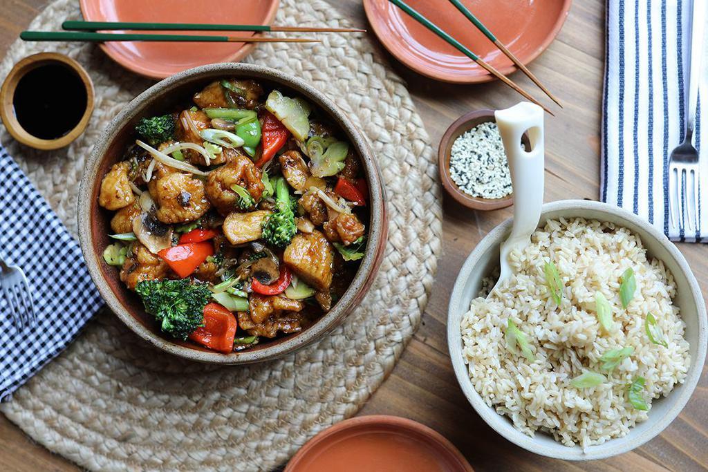Teriyaki Chicken Meal · A family-style serving of our teriyaki chicken wok made with chicken breast, mushrooms, bean sprouts, bell peppers, broccoli, onions, sesame seeds – served with choice of white or brown steamed rice.