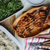 Grilled BBQ Chicken Meal · Grilled boneless chicken breasts, BBQ sauce, mashed potatoes, sauteed green beans.