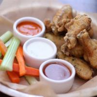 Crispy Wings · Celery, carrots, with blue cheese, BBQ + high altitude hot sauces. Spicy. 1830 calories.