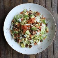 Cobb Salad · Shredded chicken breast, tomatoes, avocado, blue cheese, smoked bacon, hard-boiled egg, blue...