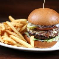 Black + Blue Burger · Grilled half-pound beef patty, blue cheese, smoked bacon, lettuce, tomato, pickle, red onion...