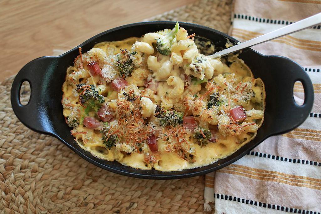 Ham + Broccoli Mac N Cheese  · Beeler’s ranch smoked ham, broccoli, and cavatappi pasta tossed with our housemade three-cheese sauce (jack, cheddar, American), topped with a parmesan herb crust + fresh parsley.