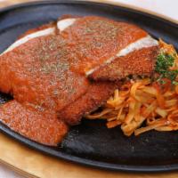 Chicken Parmesan · Hand-breaded chicken breast with melted mozzarella cheese and marinara sauce; served with fe...