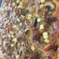 The Great Northern Pizza · House-made sausage, bacon, red onion, mushrooms, shredded mozzarella, topped with fresh appl...