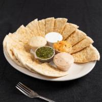 Peasant Plate · You choose :
Hummus, Tarama, Tzatziki, Spicy Feta, Mediteranean hot sauce served w/ pitas
