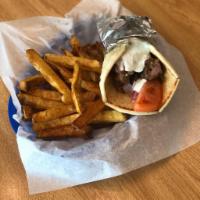 Lamb Wrap - with fresh cut fries · Charbroiled lamb tips wrapped in pita. Served w/ fresh cut fries. Choose your style & size.