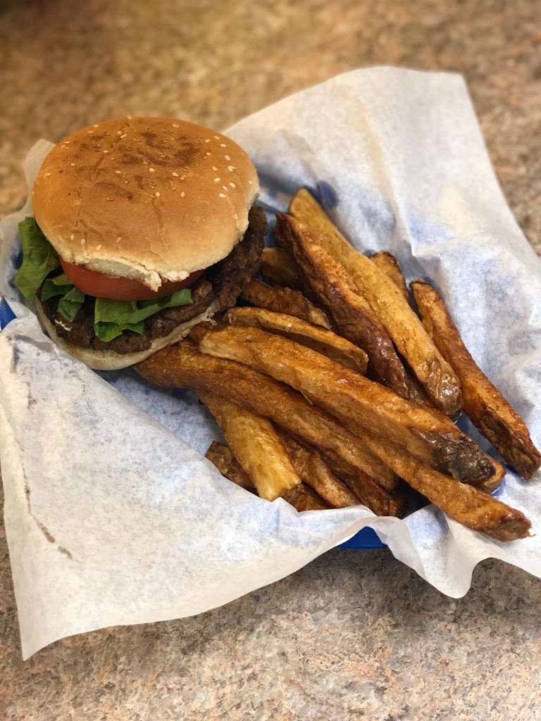 Veggie Patty Burger - with fresh cut fries · Vegetarian patty topped with mustard , mayo, onions, lettuce, tomatoes on a bun.
Served with fresh cut fries. 