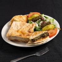 Specialty Plate · Greek salad, moussaka, pastichio, tiropita, spanakopita, and 7
