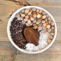 Puffy · Cacao powder, peanut butter, coconut flakes, Reese’s Puffs, Nutella! Blended with banana, co...