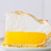 Lemon Meringue Pie Slice · Whipped and baked egg whites are toasted to golden brown to make the light, fluffy meringue ...