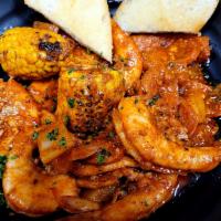 Peel n Eat Shrimp · Jumbo shrimp, Louisiana sausages, corn on the cob and red potato. Our fresh seafood is steam...