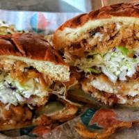 Chicken Fried Sandwich  · Fried chicken breast housemade from scratch with pickle, slaw, crispy onions and SS house dr...