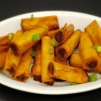 Lumpiang Shanghai · Crispy fried roll with sweet and sour sauce.