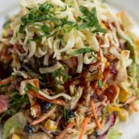 Rotisserie Chicken Salad  · Rotisserie chicken, mixed greens, jicama, black beans, avocado, tomato, corn, carrots, torti...