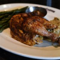 Wood Fried Rotisserie Chicken Plate · Slow-roasted to bring you maximum flavor. Served with mashed potatoes and green beans.