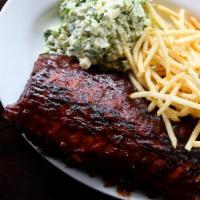 Barbecue Pork Ribs  · Slow-cooked and fall-off-the-bone tender, with french fries, and coleslaw.