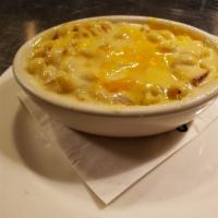 Bacon Mac and Cheese · Diced onion, applewood bacon, and cayenne pepper tossed with sharp white cheddar cheese, cre...